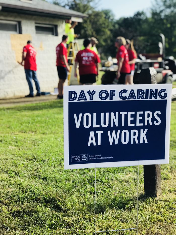 Day of Caring volunteer sign