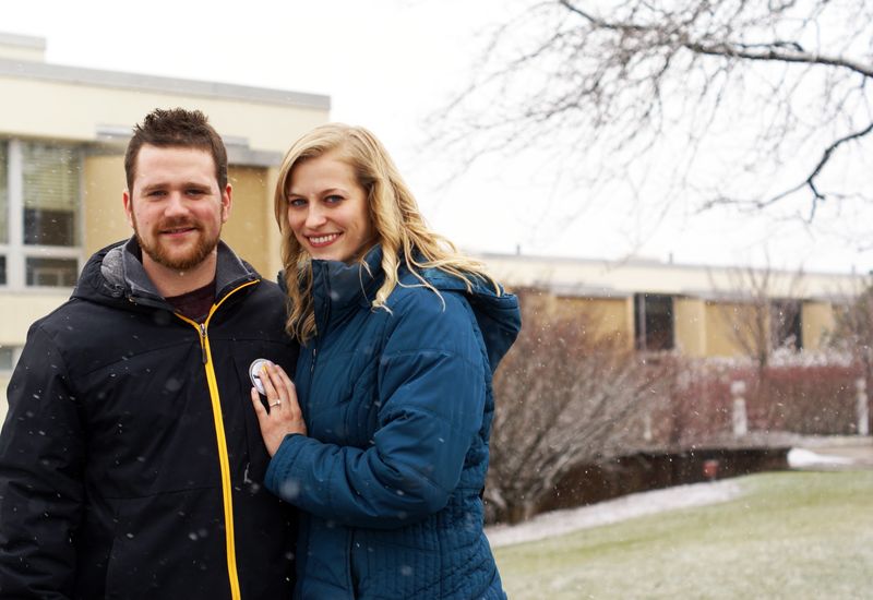Greg Zyhowski and Ashley Myerski stand in front of New Kensington campus