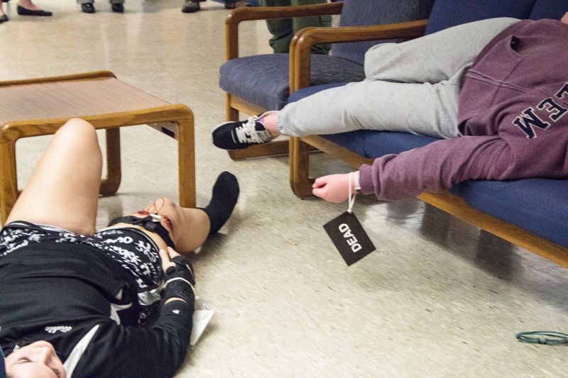 Students play dead during an active shooter training at Penn State Beaver.