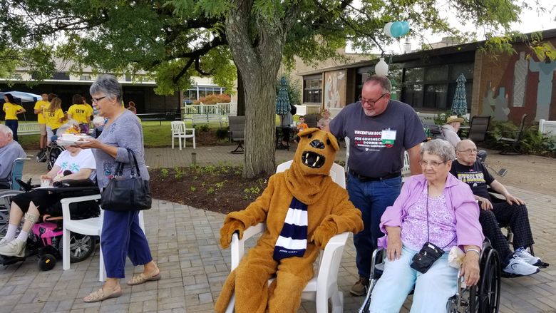 Penn State mascot sits with residents at Vincentian Senior Citizens Home