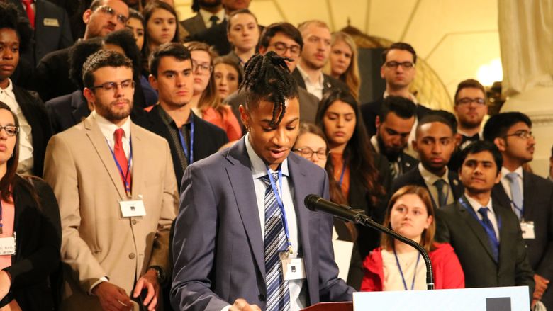 Student speaks at podium