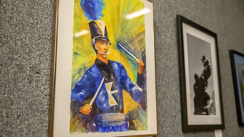Watercolor painting of marching band drummer