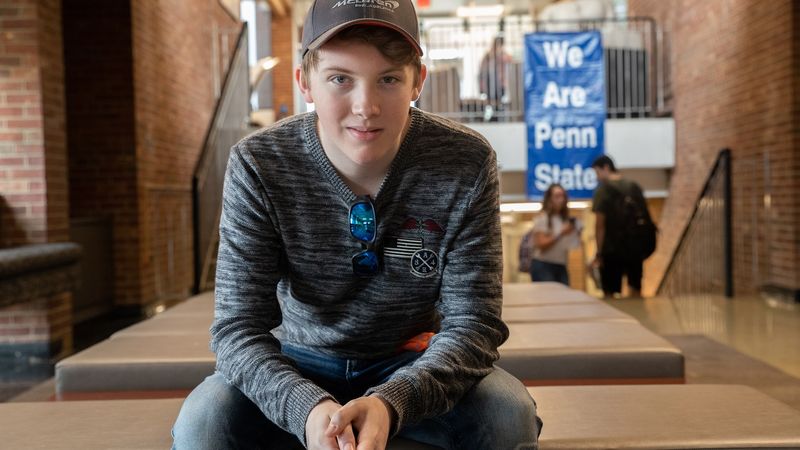 Mack Adams sits in lobby of New Kensington campus