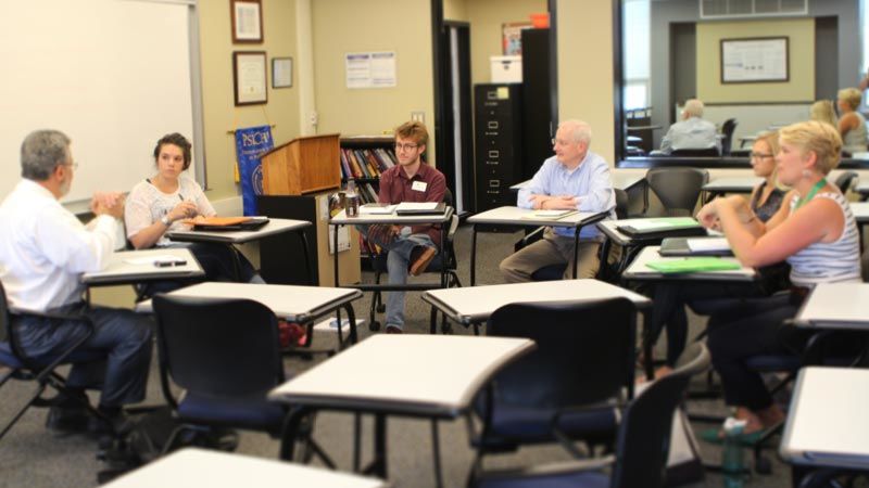 Psychology students and faculty in classroom