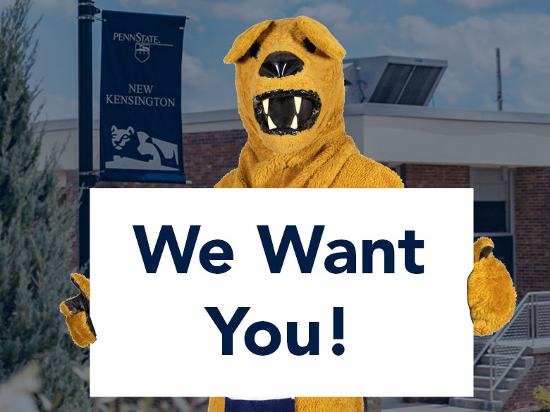 Nittany Lion mascot holds sign reading, "We Want You!"