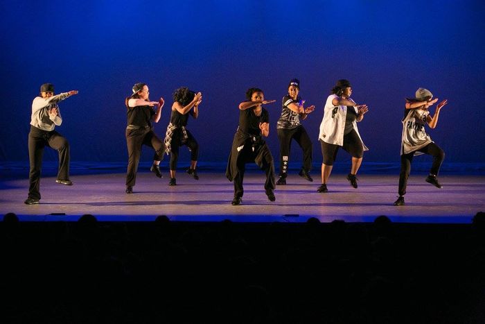 Step group performing on stage