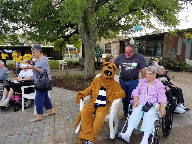 Penn State mascot sits with residents at Vincentian Senior Citizens Home