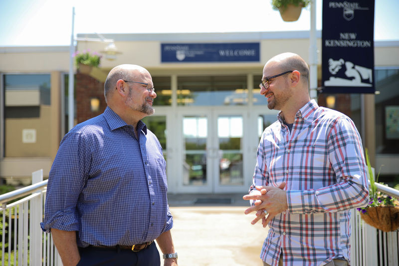 Kevin Snider, chancellor of Penn State New Kensington, speaks with Joseph Cuiffi, assistant teaching professor and program coordinator of EMET