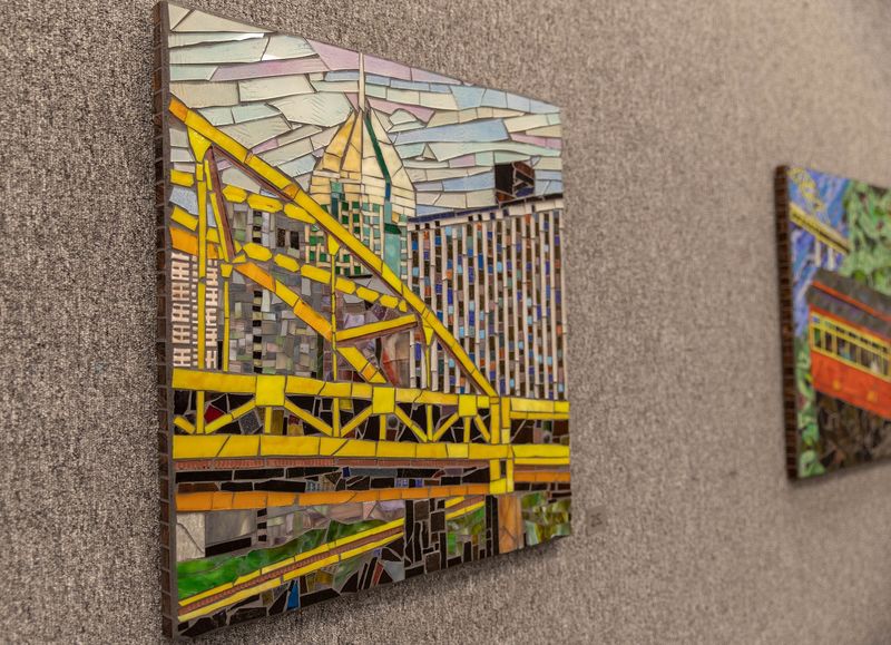 Glass mosaic artwork hung on wall Glass mosaic artwork hung on wall