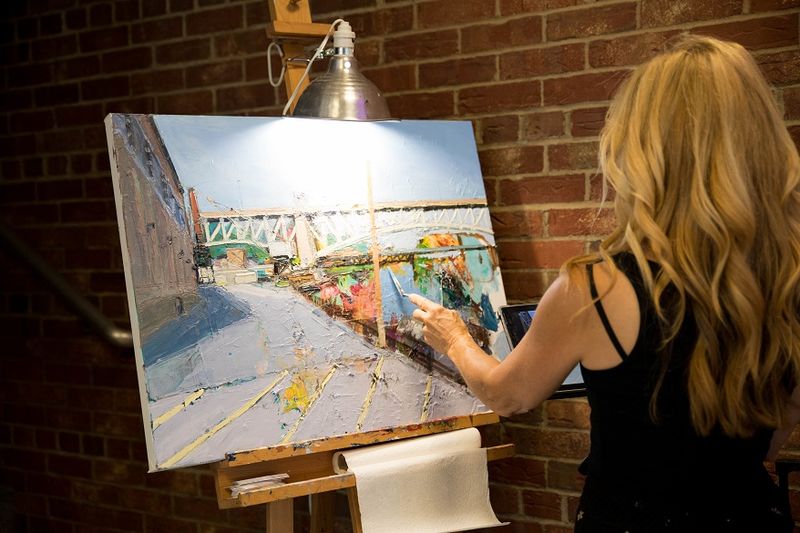 Joyce Werwie Perry paints at the Off the Wall pARTy