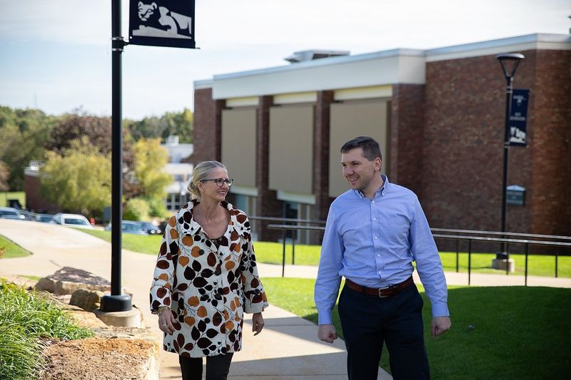 Ruth Herstek and Sean Bridgen walking outside Ruth Herstek and Sean Bridgen walking outside