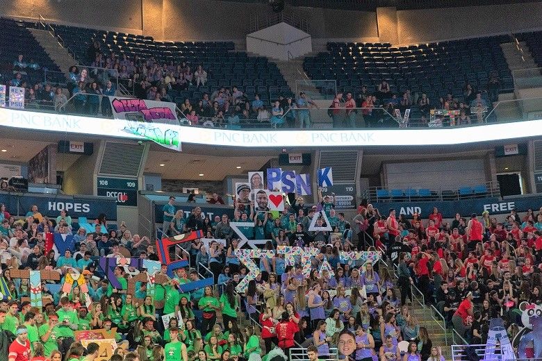 Thousands of students in arena Thousands of students in arena