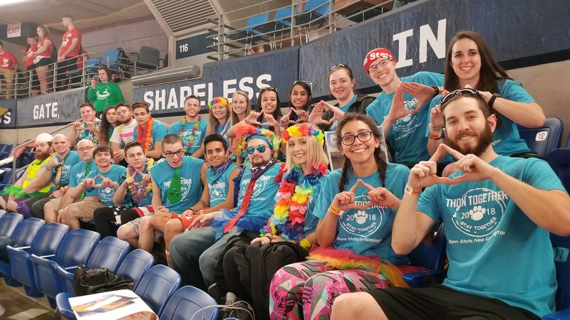 Students sitting in arena seats Penn State New Kensington students in the stands at THON 2018
