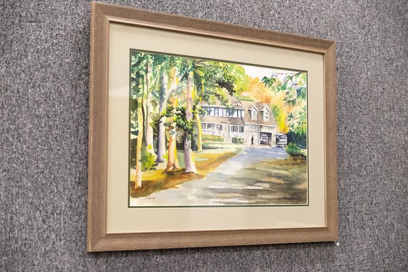 Painting hanging on wall Painting hanging on wall