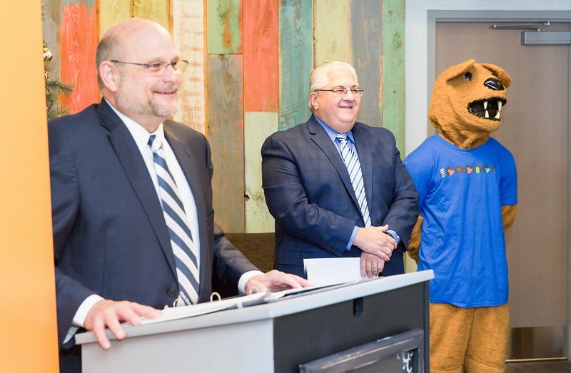 Dr. Kevin Snider, Chancellor, Penn State New Kensington (left), Thomas Guzzo, Mayor, City of New Kensington, and the Nittany Lion mascot