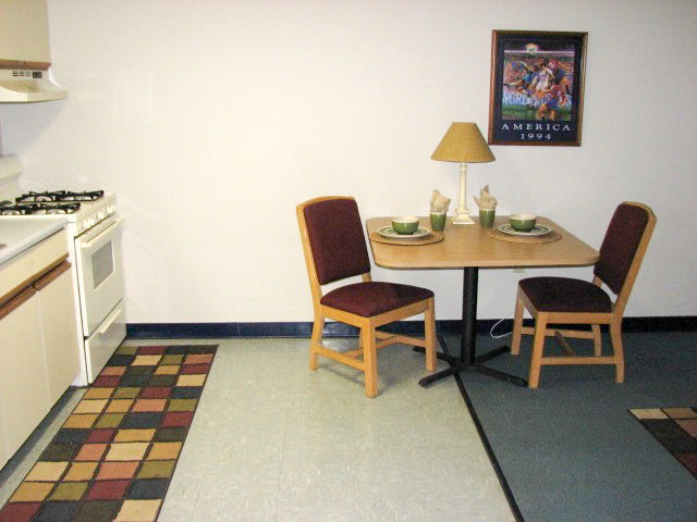 The dining area with table and chairs