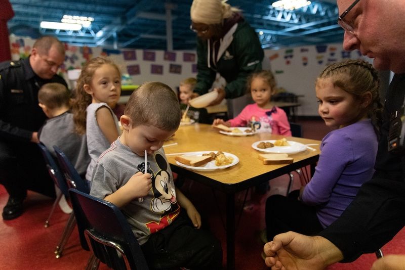 Police officers visit children in childcare