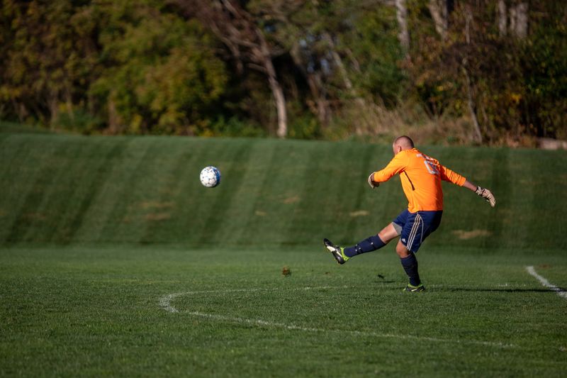 Man kicks soccer ball