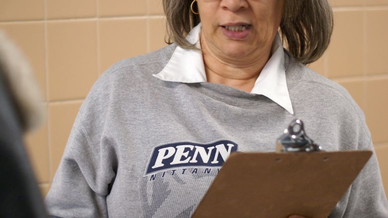 Marcella Moore with clipboard
