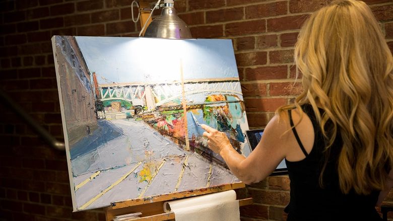 Joyce Werwie Perry paints at the Off the Wall pARTy