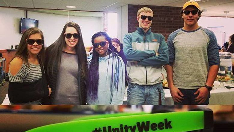 New Kensington students show off their new Unity Week sunglasses