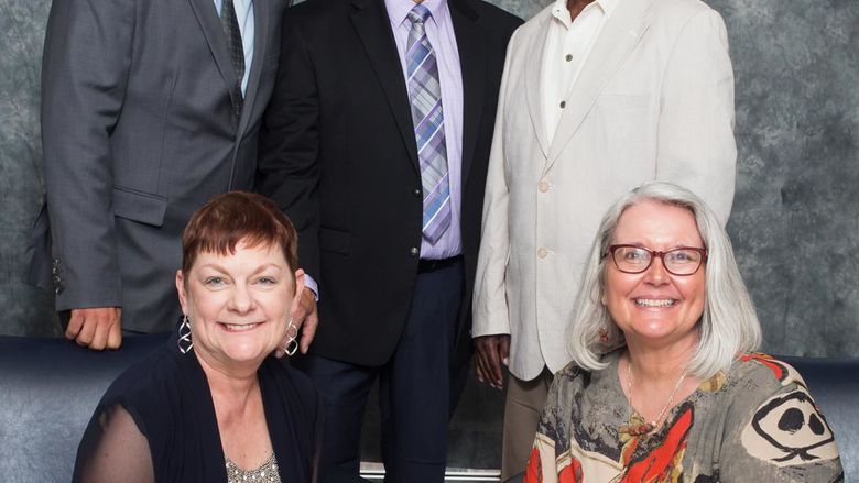 The four Distinguished Alumni Award winners with Chancellor Snider