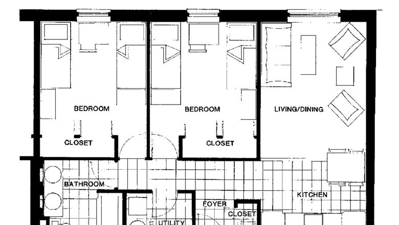 An apartment floor plan that shows two bedrooms, a living room, kitchen, bathroom, utility room, and foyer.