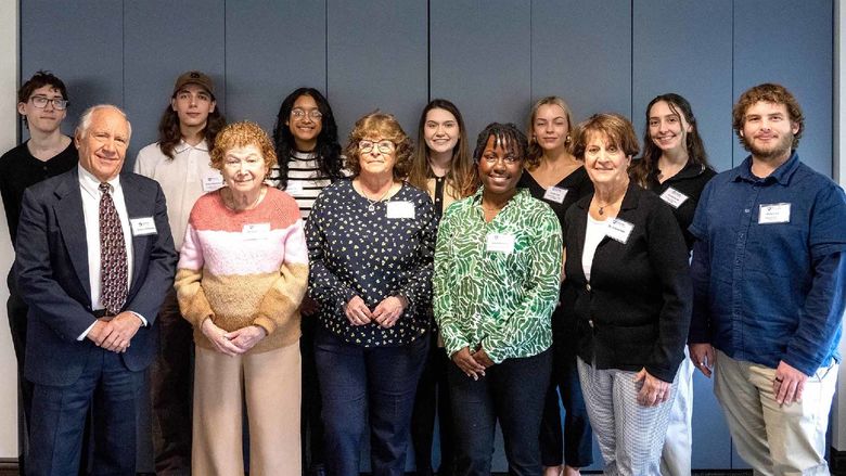 Students and community members pose for a group photo at Penn State New Kensington's scholarship luncheon.