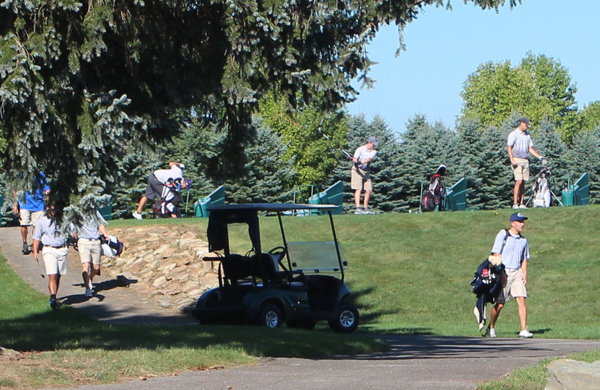 Golfers leaving the range Practice range