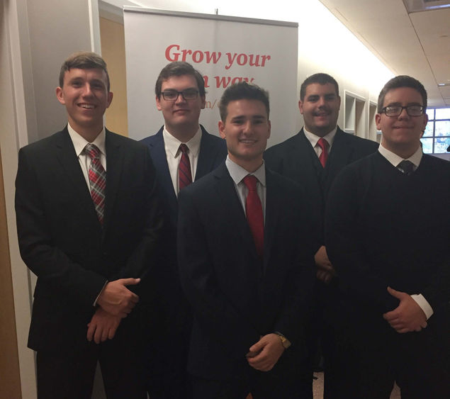 Business students at PwC case competition Business students
