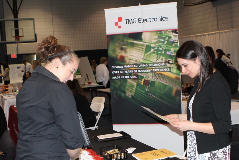 Staudent talking to employer Student at career fair