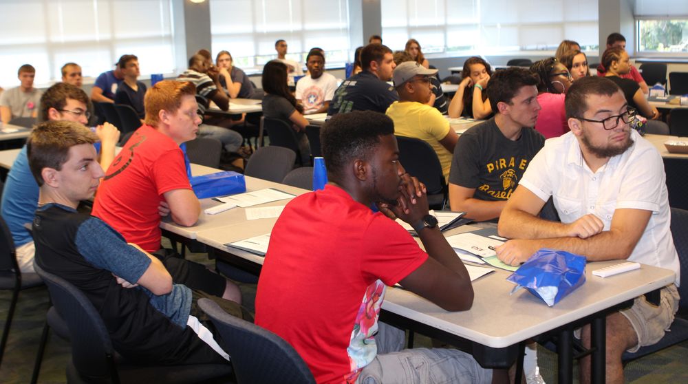 Prospective students and families on campus Admissions event