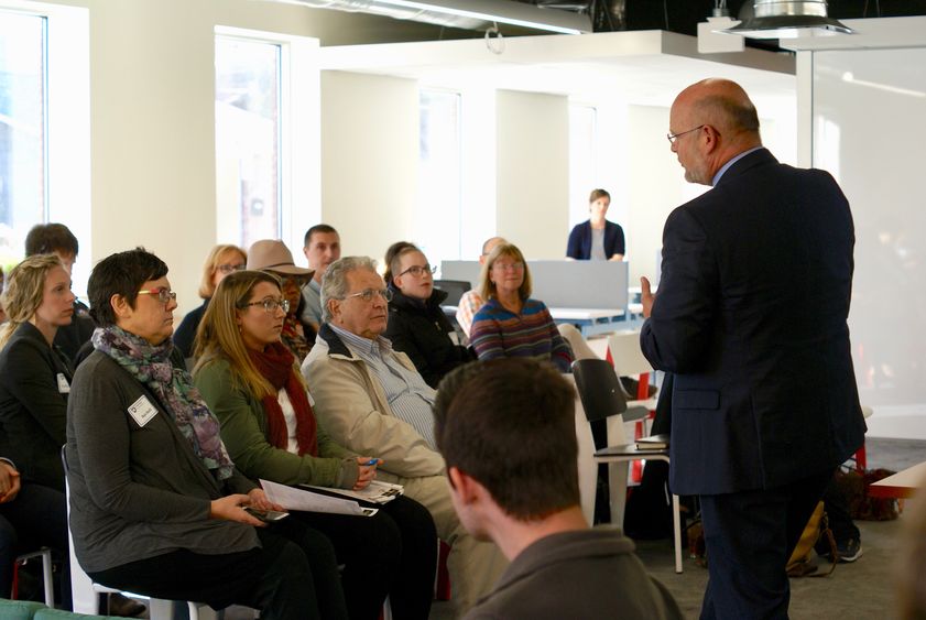 Chancellor Kevin Snider tells workshop participants about the history of The Corner entrepreneurial center