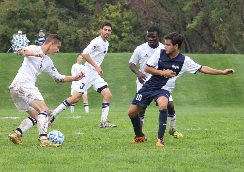 Players brings up the ball Soccer game