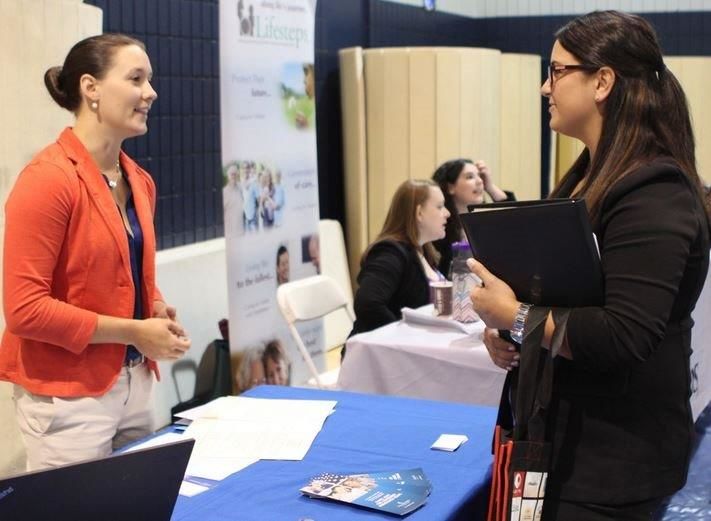 Job seeker speaks to potential employer at Alle-Kiski Job Fair Job seeker speaks to potential employer at Alle-Kiski Job Fair