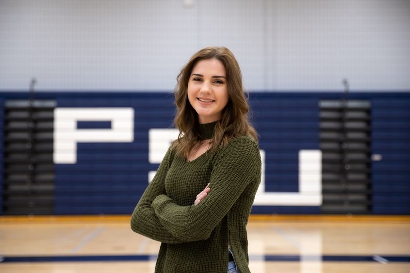 Kaylea Flick stands in gymnasium Kaylea Flick stands in gymnasium