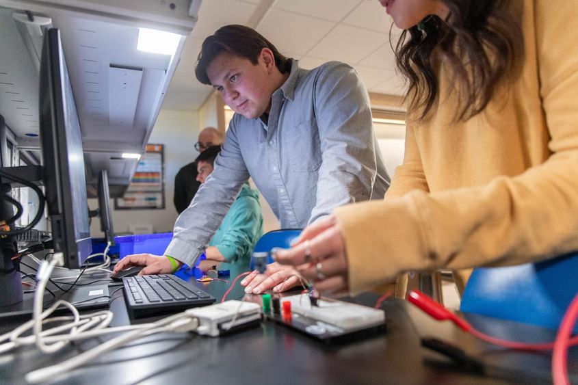 James Matus looking at computer